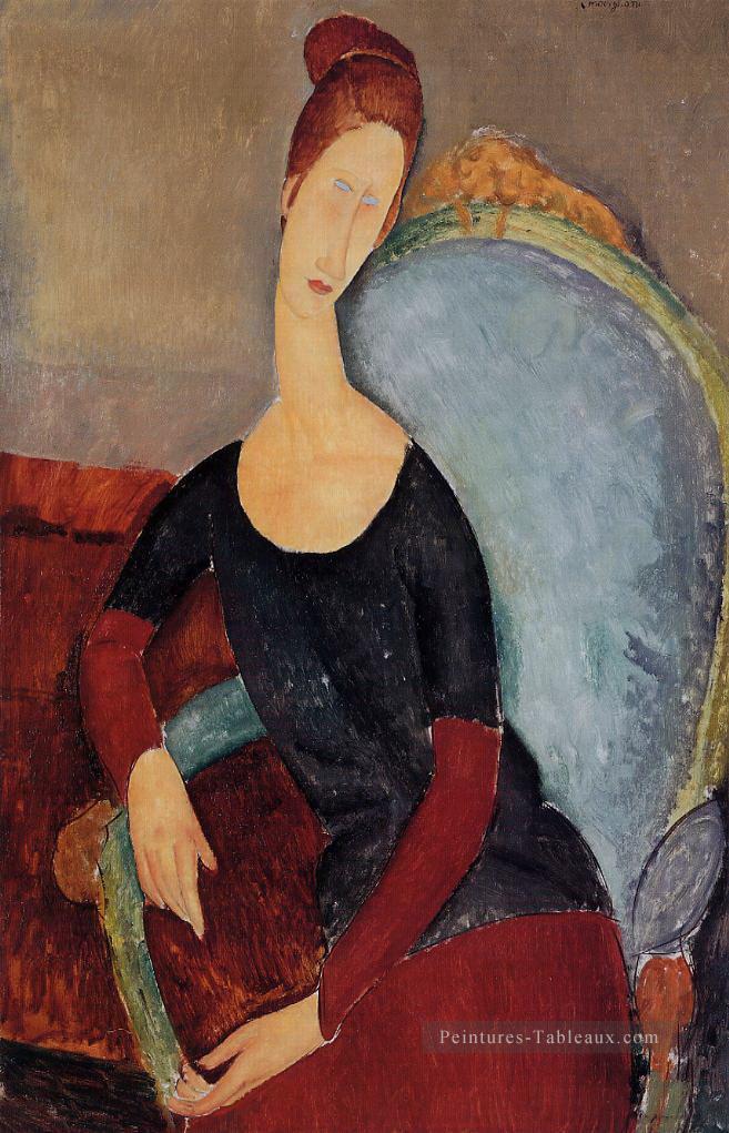 portrait de jeanne hebuterne dans une chaise bleue 1918 Amedeo Modigliani Peintures à l'huile